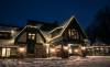 An elegant roofline of twinkling lights