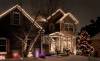 Roofline and tree with custom Christmas lights in St. Paul area