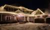 A simple white lighted roof line in the Minneapolis area